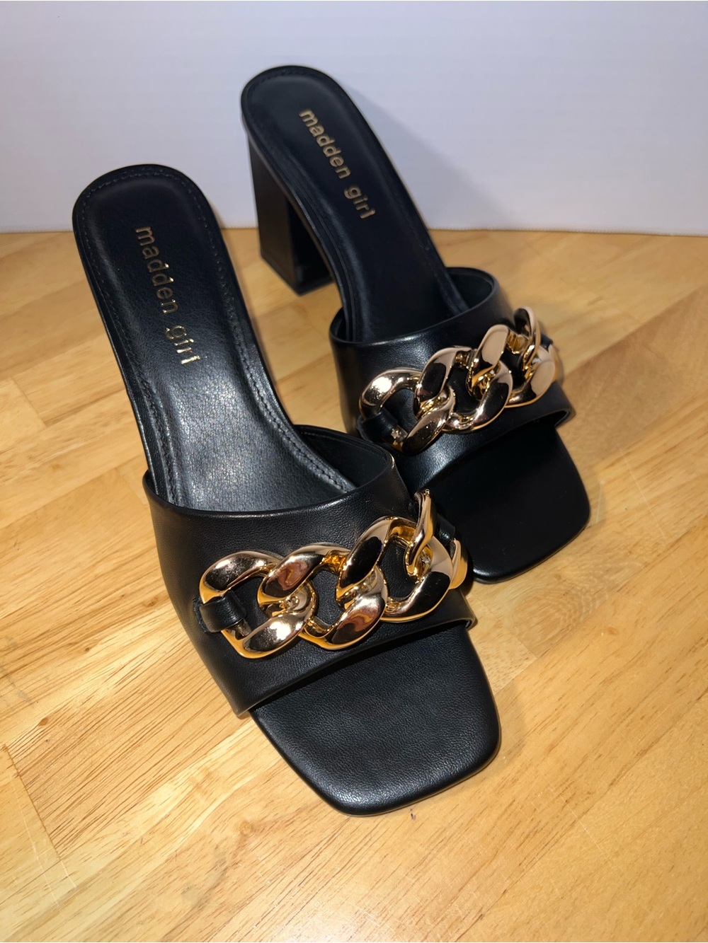 Chunk heel . Beautiful gold chain on top. Never worn.